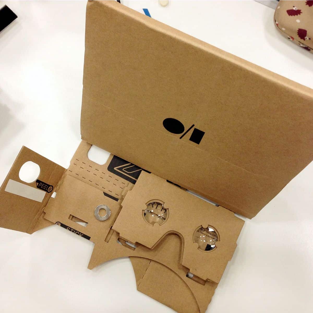 A foldable cardboard virtual reality headset.