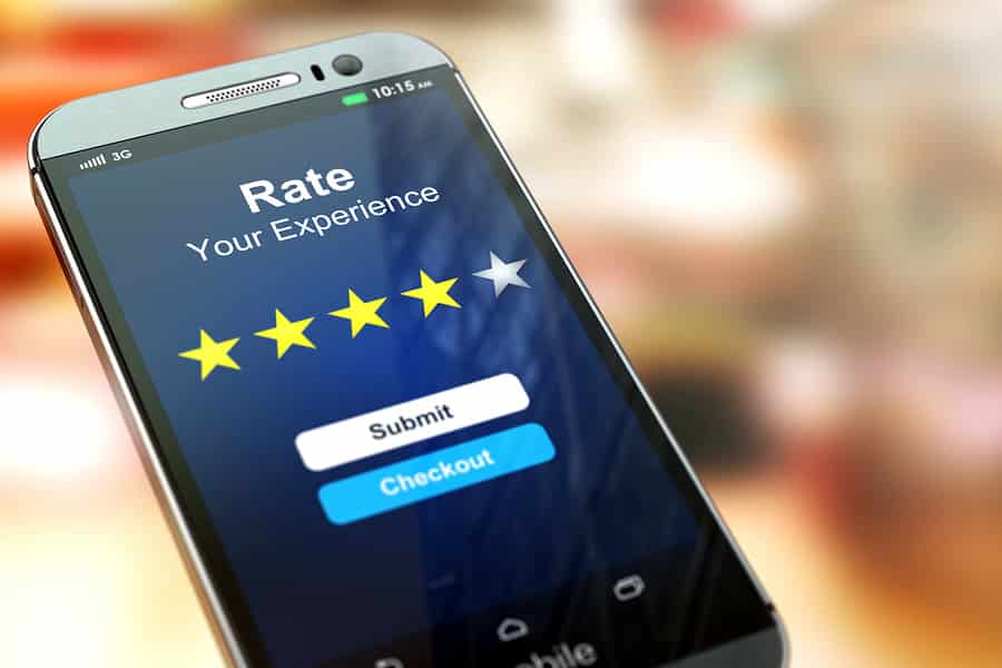 A photo of a mobile phone screen prompting the user to rate their experience in an app.